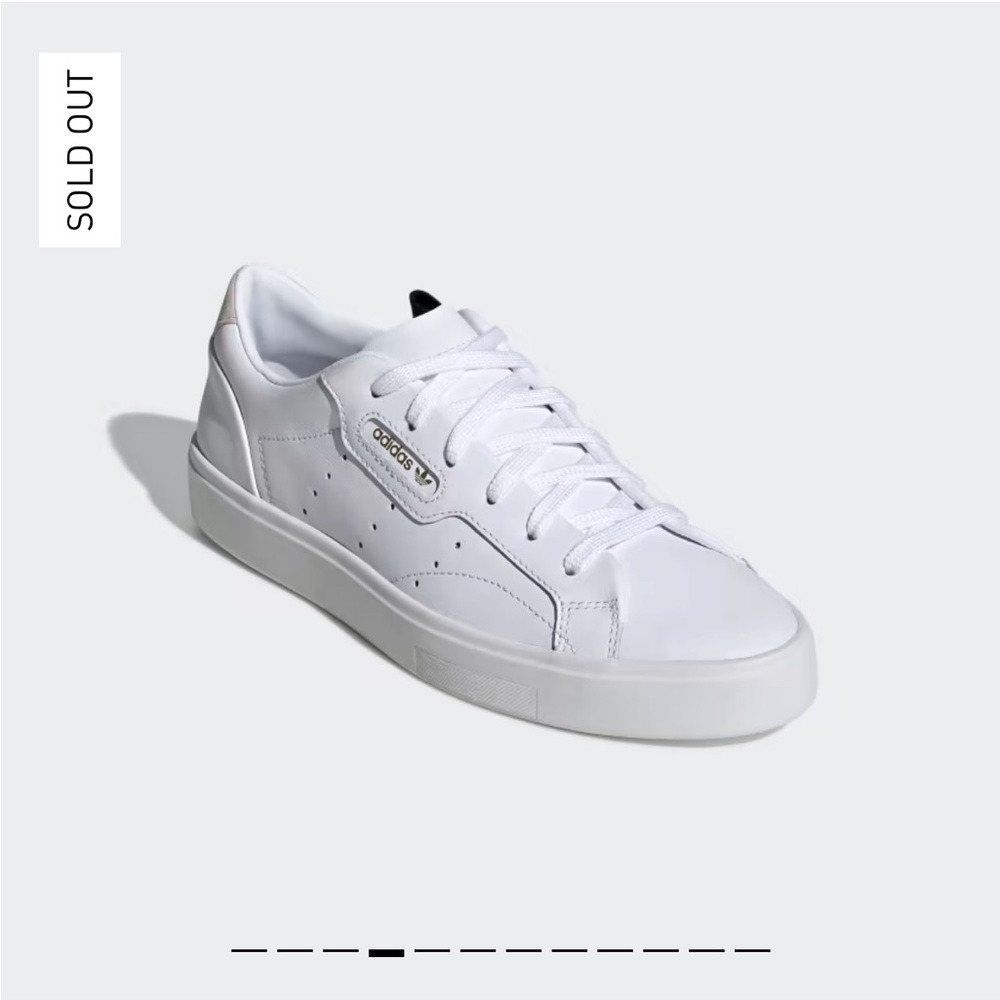 Adidas Sleek White Leather Sneakers with Gold Accent